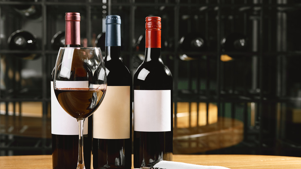 Collection of wines and a glass of red 