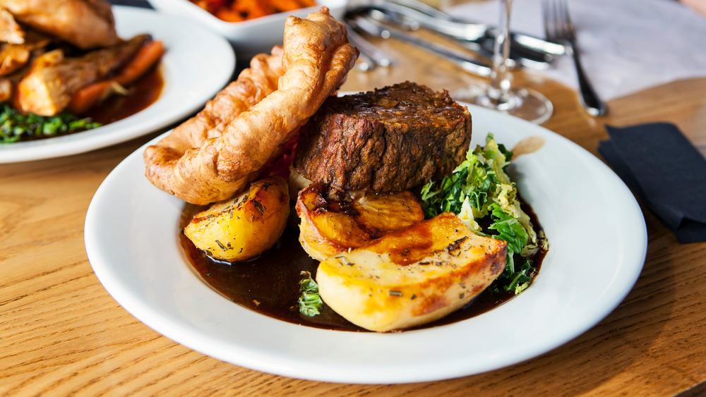 Yorkshire pudding with meat, potatoes and gravy