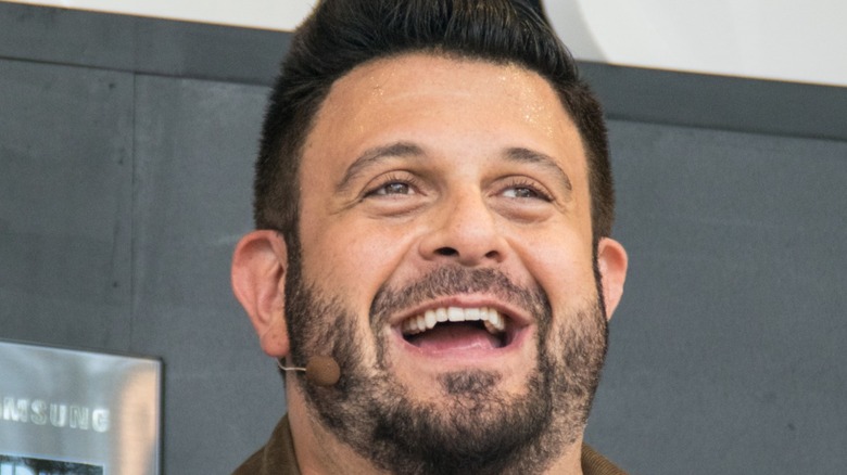 Adam Richman smiling