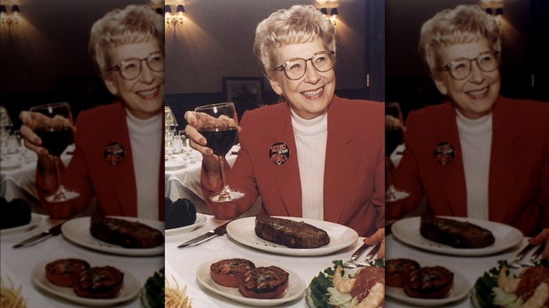 ruth fertel enjoying a steak