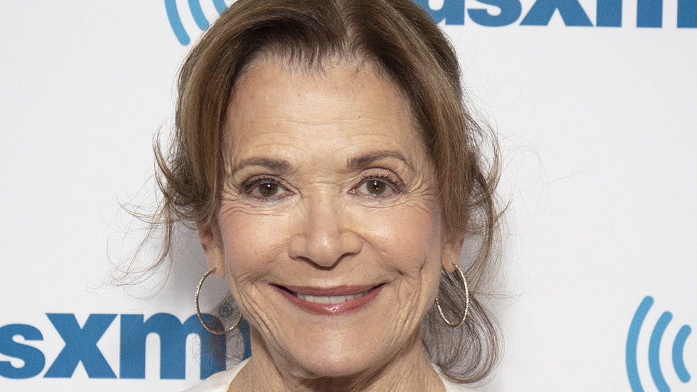 Jessica Walter in hoop earrings