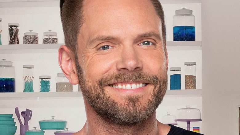 Crime Scene Kitchen host Joel McHale smiling