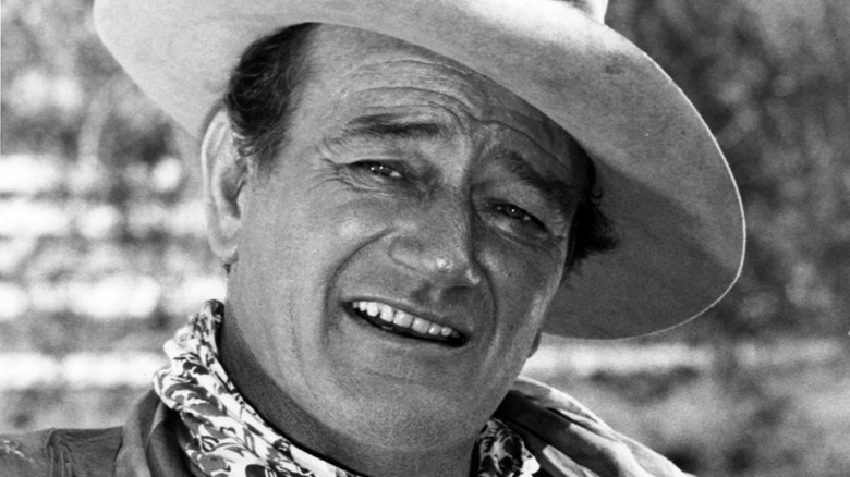 John Wayne wearing a cowboy hat