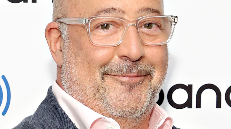 Andrew Zimmern wearing glasses