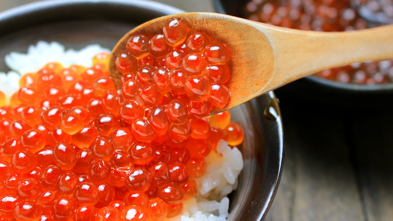 Salmon roe spooned over rice