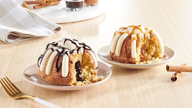 Churro dulce de leche & churro de chocolate from Nothing Bundt Cakes on plates