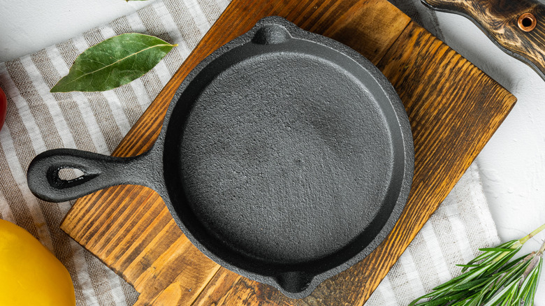 Cast iron skillet on wooden cutting boards