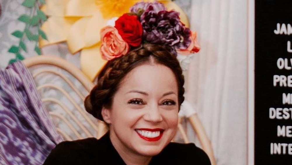 Marcela Valladolid smiling with flower crown