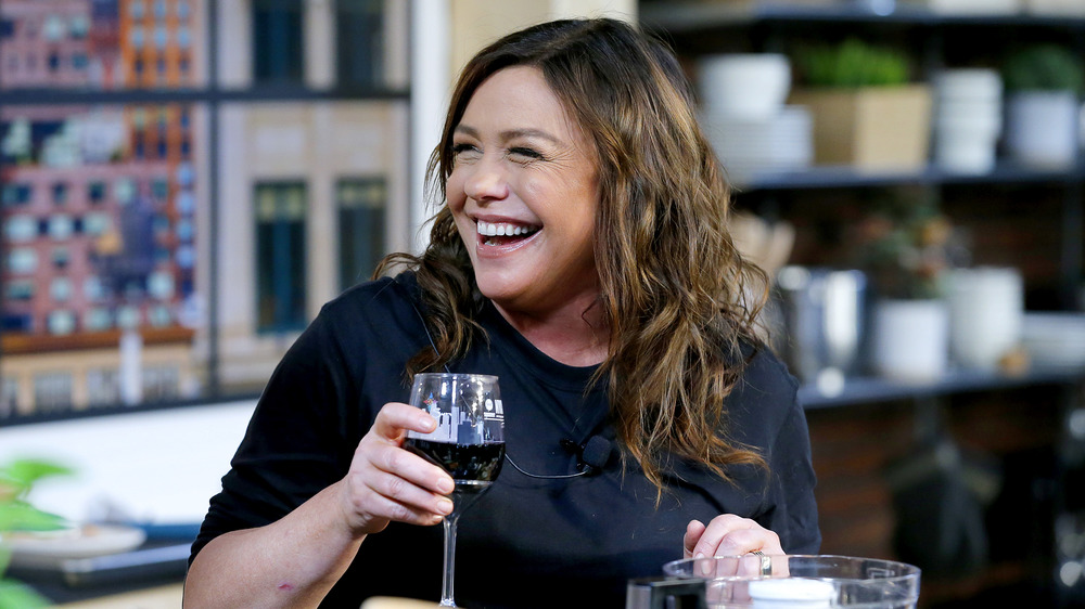 Rachael Ray with wine, smiling