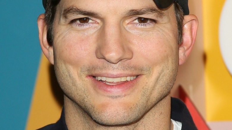 Ashton Kutcher smiling