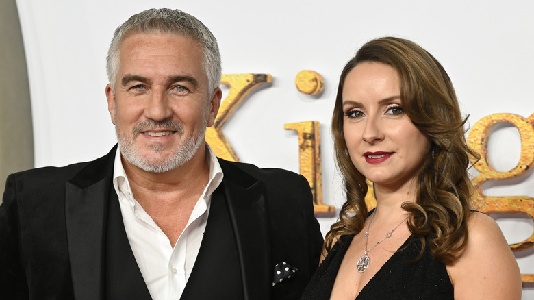 Paul Hollywood and Melissa Spalding smiling at event