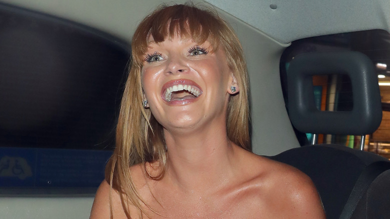 Summer Monteys-Fullam laughing in the back of a car