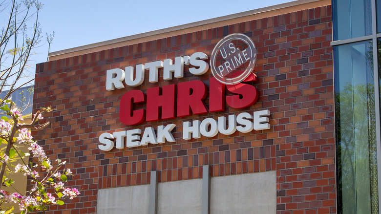Ruth's Chris sign on brick building