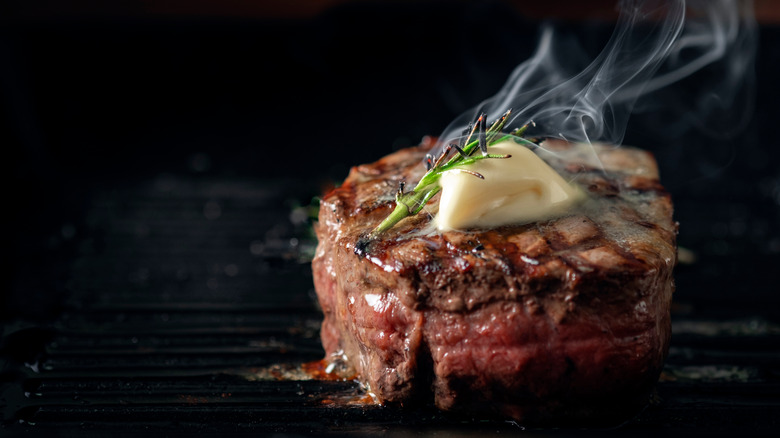 pat of butter on hot steak