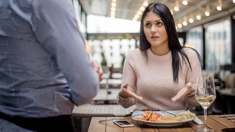 Woman complaining in restaurant