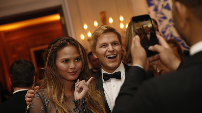 Ronan Farrow in a tux with Chrissy Tiegan