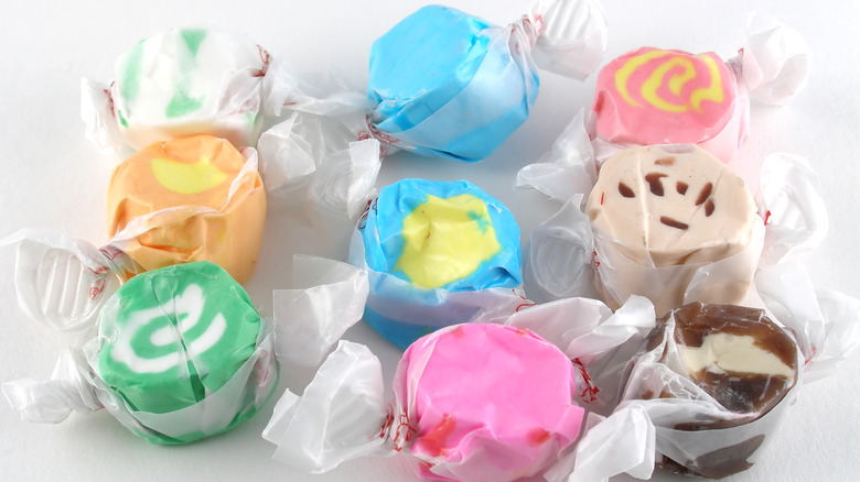 Colorful salt water taffy in wrappers