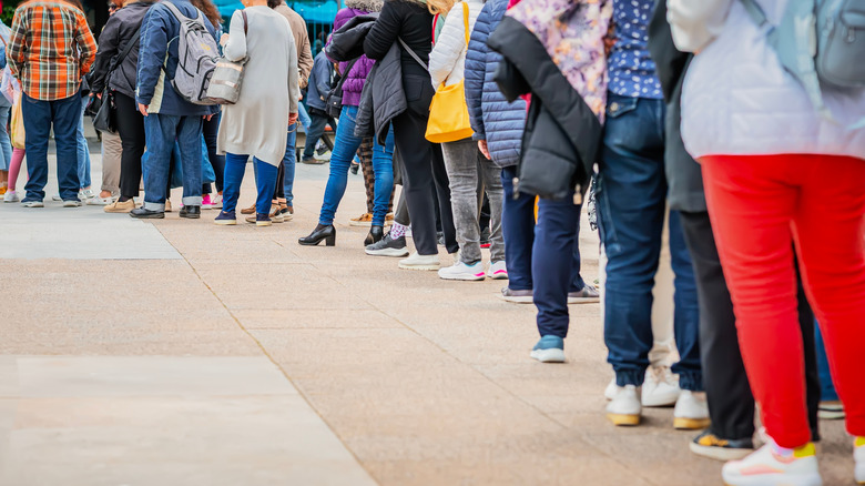 People waiting in line outside