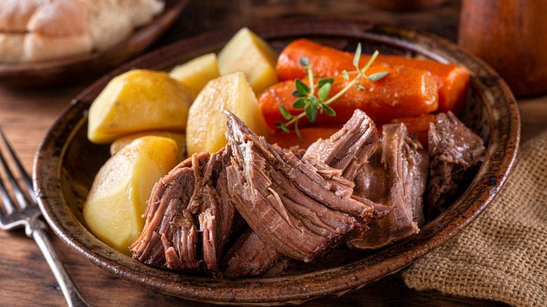 pot roast potatoes carrots plate