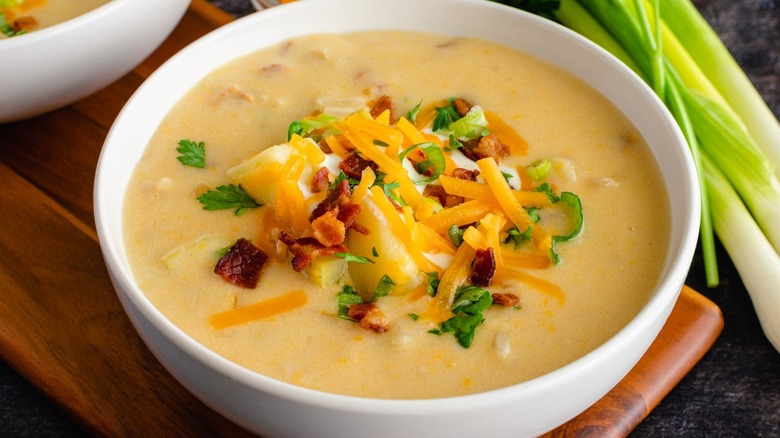 Soup with cheese and bacon on top