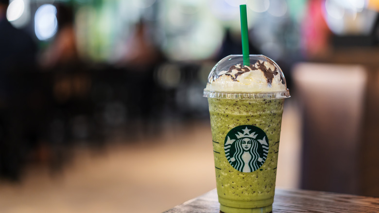 A Starbucks matcha Frappuccino on a table