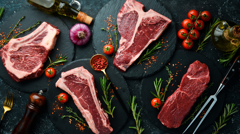 different cuts of steak on plates