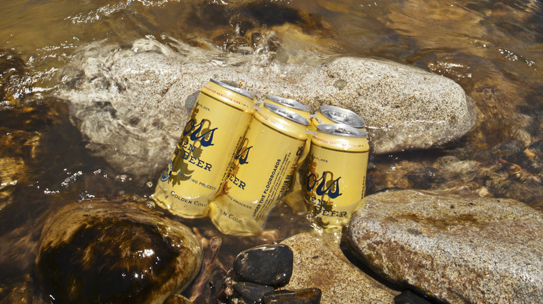 Coors beers cooling in river