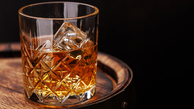 Bourbon served on the rocks in an etched rocks glass