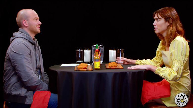 Alexa Chung being interviewed on "Hot Ones"