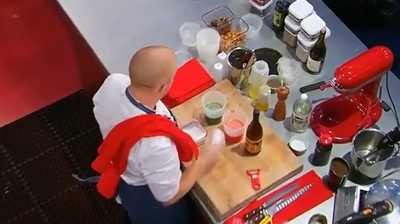 Iron Chef America contestant cooking