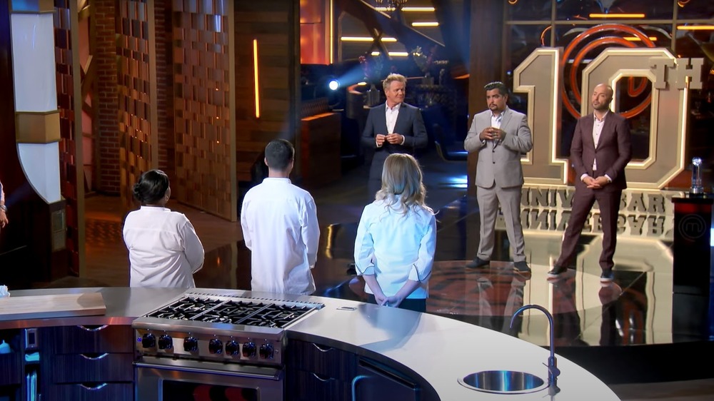 Judges and contestants on Masterchef