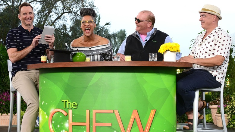 the chew hosts laughing