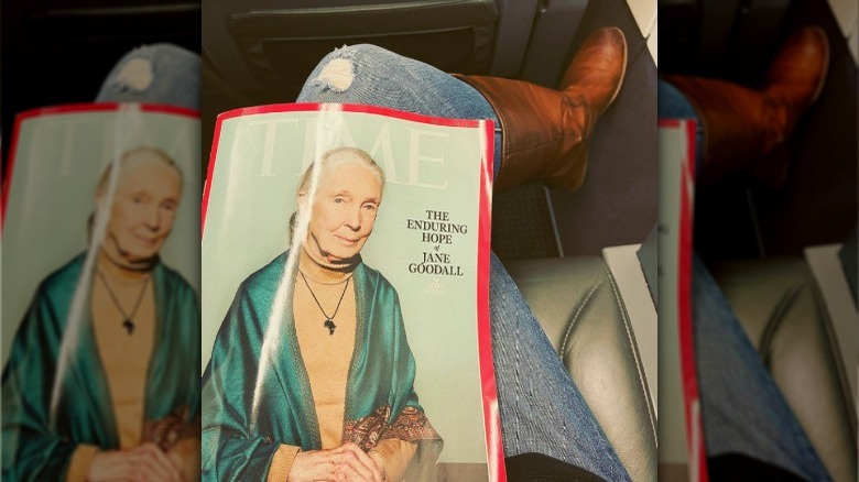 Ree Drummond sitting in an airplane seat with Time Magazine on her lap