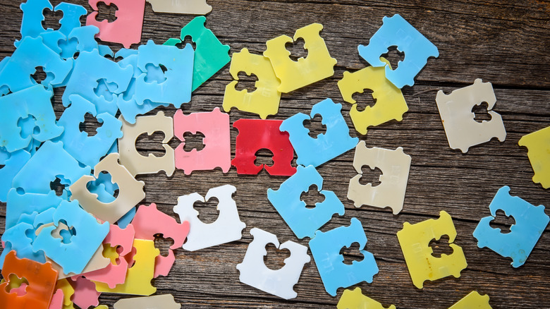 A pile of multicolored bread tabs