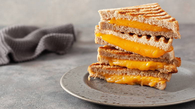 Grilled cheese sandwich triangles stacked 