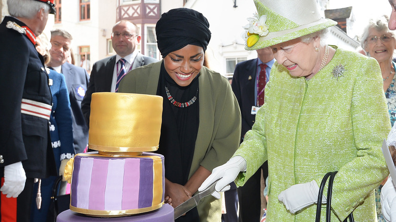 Nadiya Hussein and Queen Elizabeth with 90th birthday cake
