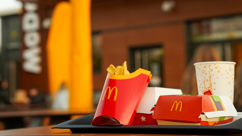 McDonalds meal on tray set on outdoor table
