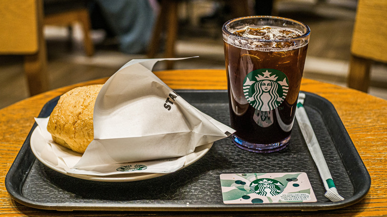 A sandwich and iced Americano at Starbucks