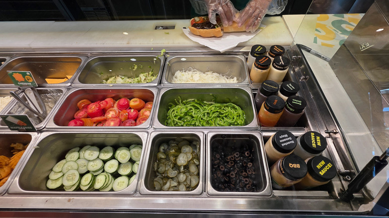 Ingredients behind counter at Subway
