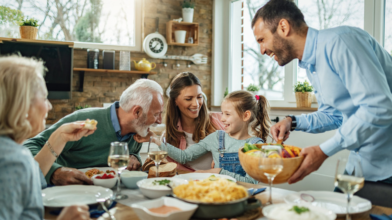 Family eating dinner together