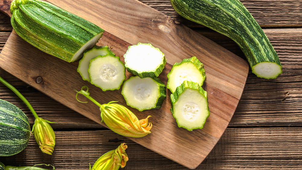 sliced zucchini on cutting board