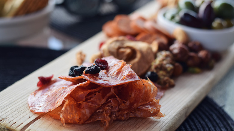 charcuterie board with cured meats