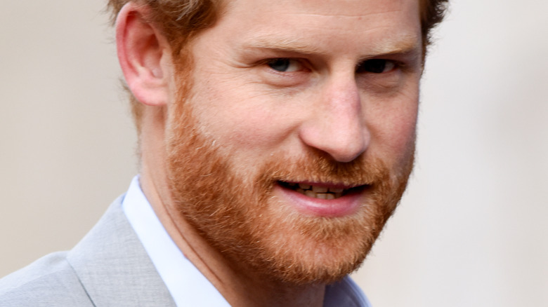 Prince Harry smiling at charity event