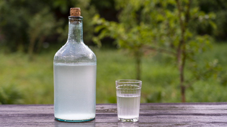 Unlabeled bottle of moonshine