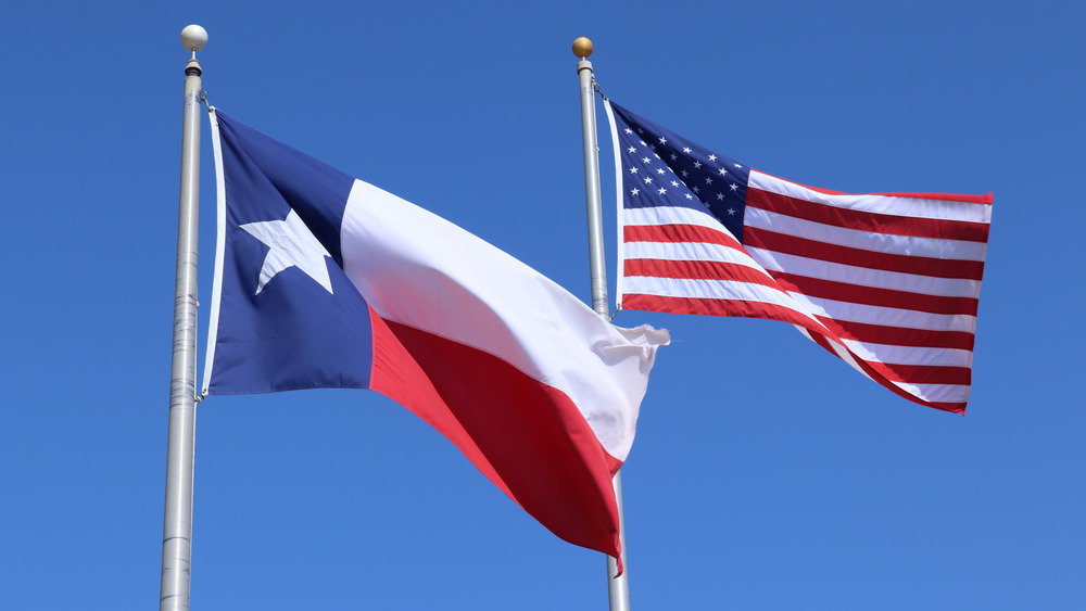 Texas Flag and American Flag flown together
