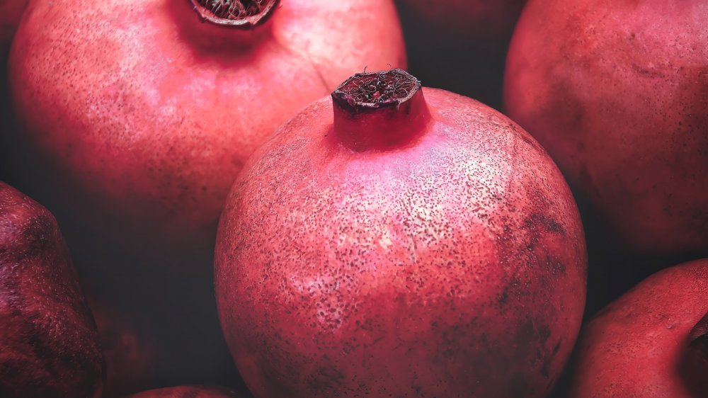 Pomegranates bunched together