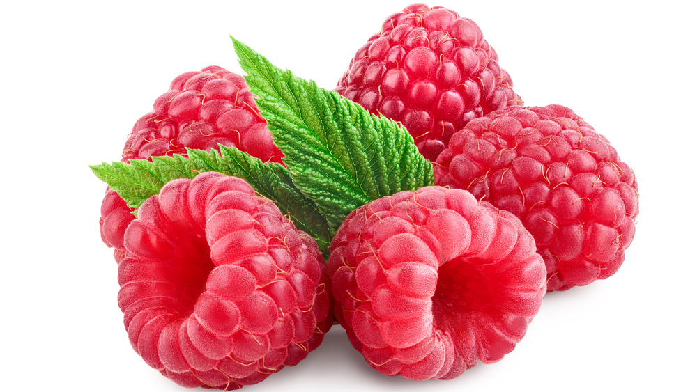 Five raspberries with leaf