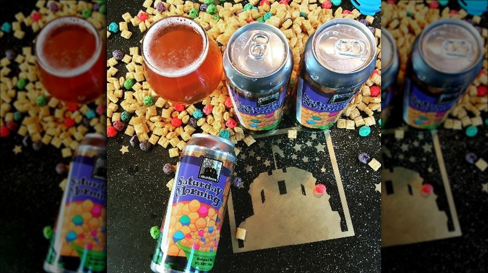 Cans and glass of Saturday Morning with cereal