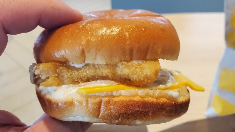 McDonald's filet-o-fish in person's hand