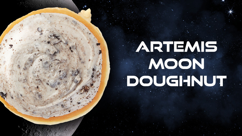 a moon themed donut against a space background